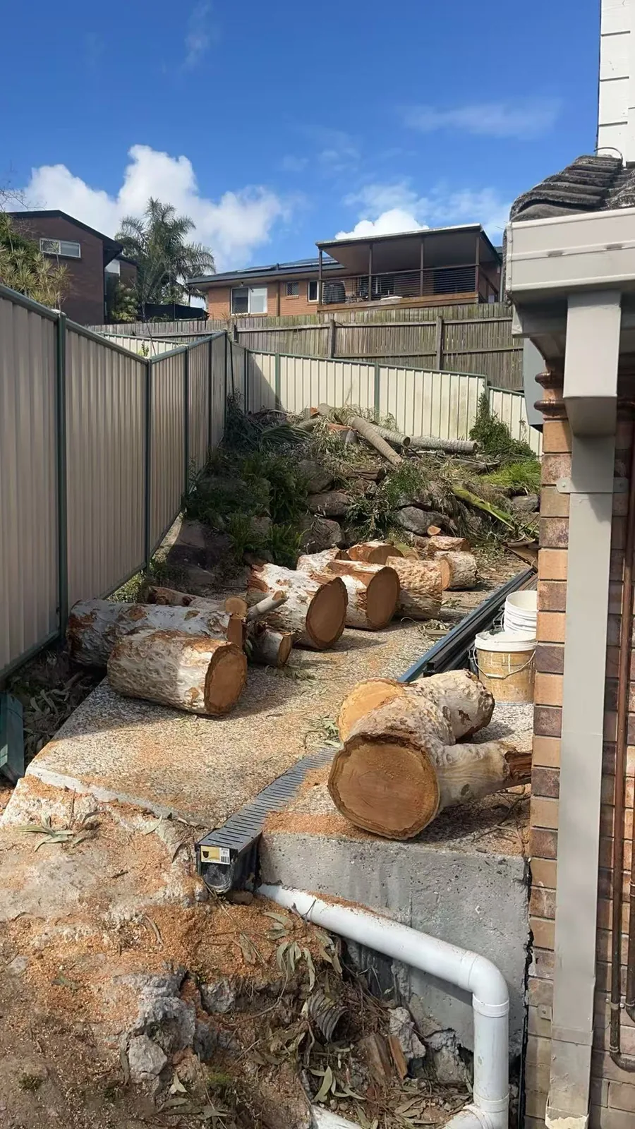 Cut timber sections on a steep residential block